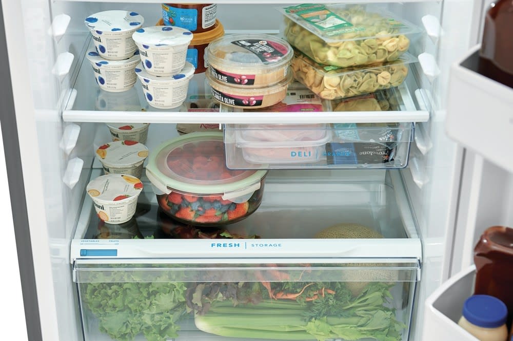 Frigidaire 28 Inch Top Freezer Refrigerator with 13.9 Cu. Ft. Capacity, Adjustable Glass Shelves, Humidity-Controlled Crispers, Half-width Deli Drawer, LED Lighting, EvenTemp® Cooling System, ADA Compliant, and ENERGY STAR Certified: Black